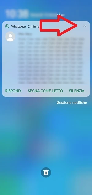 schermata di whatsapp dove è indicata la freccia che mostra il messaggio di chat ricevuto per intero